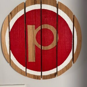 Hand painted Pure Barre “P” wooden sign